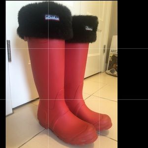 Bright coral Hunter rain boots